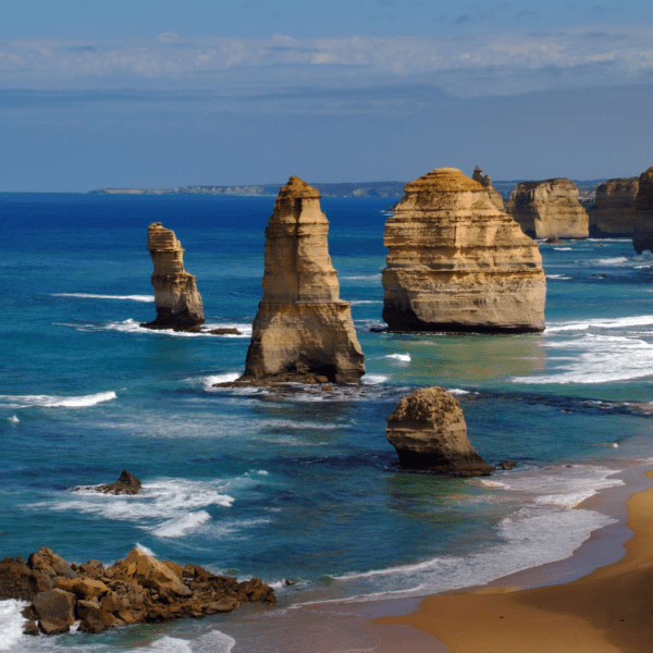 Shoreline of Australia with dramatic rock formations and coastal waves