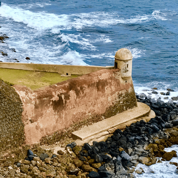 St kitts and Nevis castle by beach with waves breaking on shore