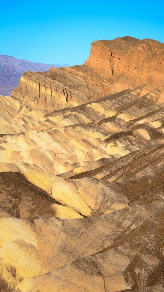 yellow rock formation in death valley