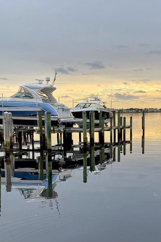 boats in dock at sunrise at Harbour Ridge Yacht and country club in Palm City, Florida