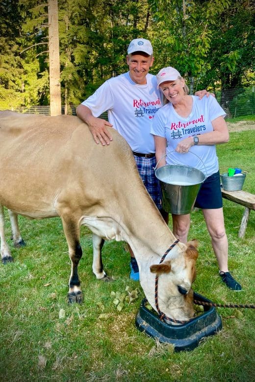 Bev & JOhn with cow and milk in bucket