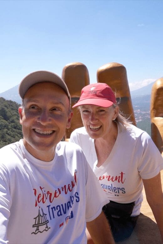 John & Bev sitting at top of hill overlooking Antigua