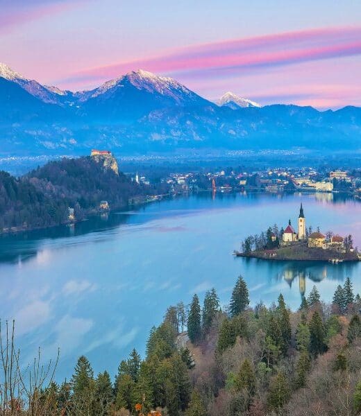 view of lake, mountains and island at lake bled slovenia