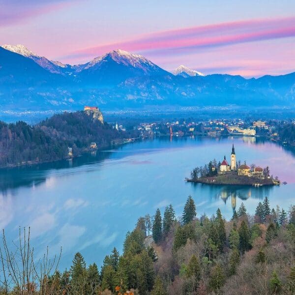 view of lake, mountains and island at lake bled slovenia