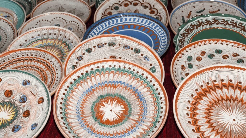 plates stacked with traditional colors of earthtones