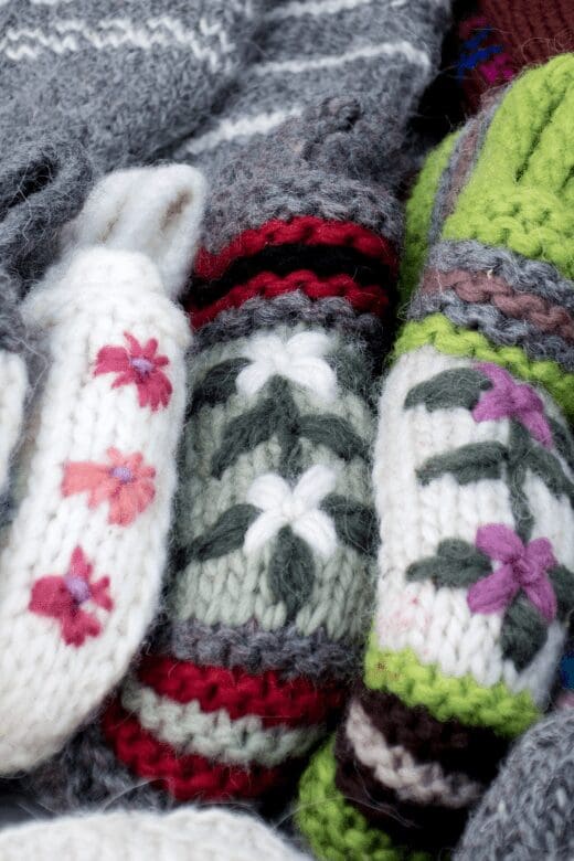Row of different color mittens