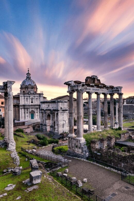 Ancient ruins with a sunrise background in Rome, Italy