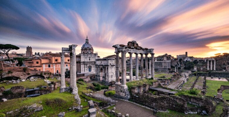 Ancient ruins with a sunrise background in Rome, Italy