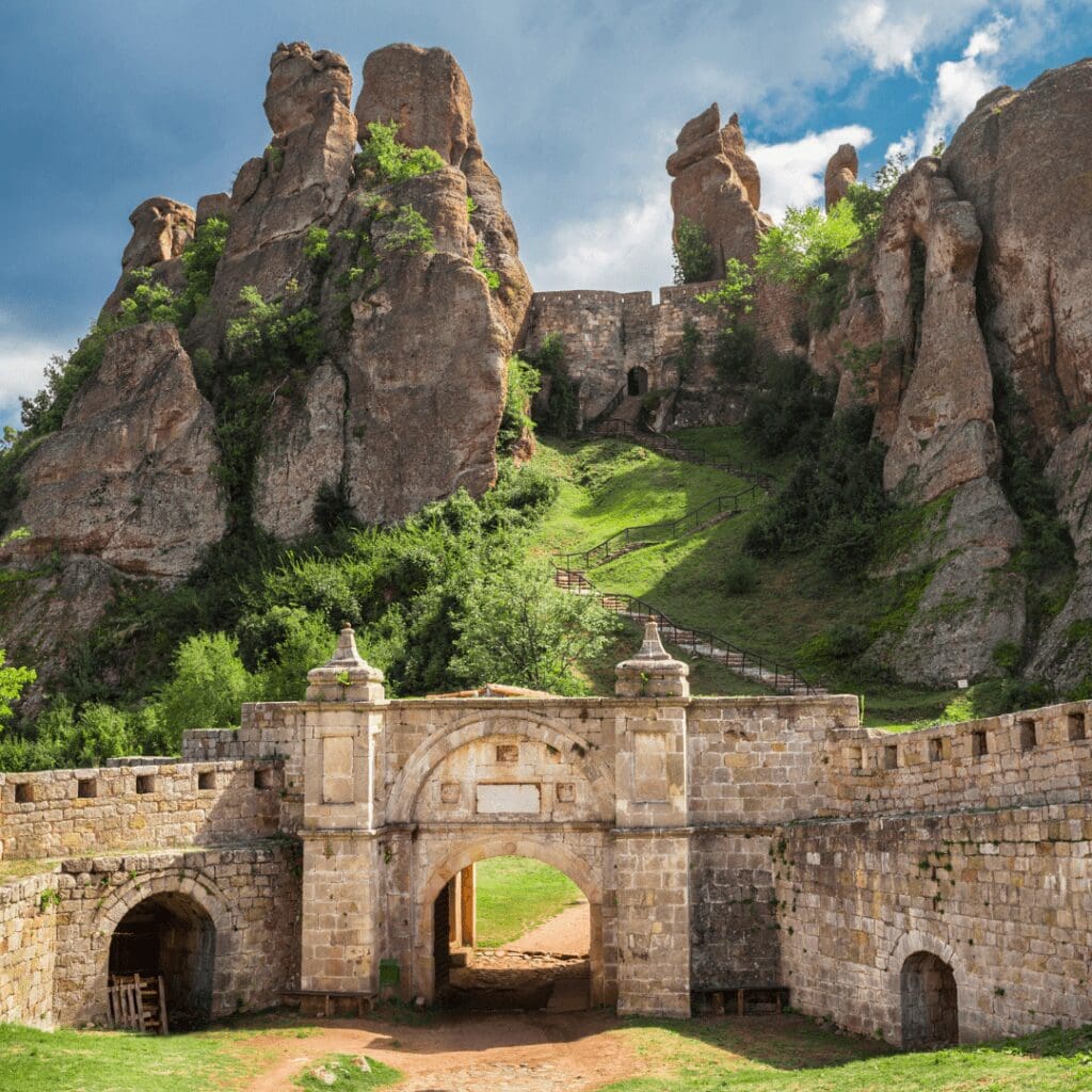 fortress with rock mountains behind