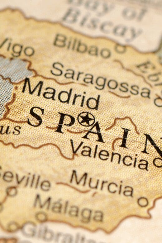 a golden map with Spain and Madrid in the middle