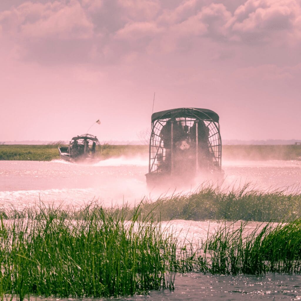 an airboat at sunset in the park