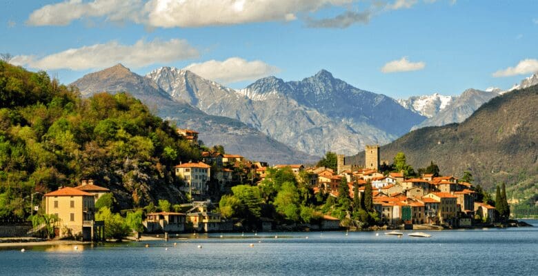 View of lake como, Italy with city and mountains in background