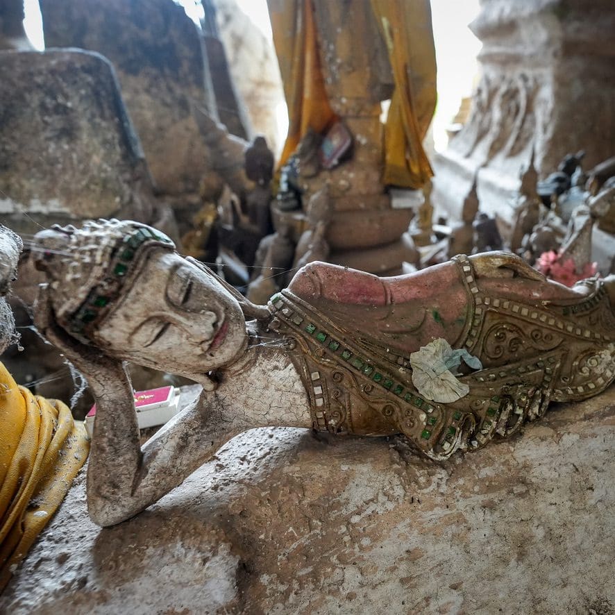 reclining Buddha statue in a cave