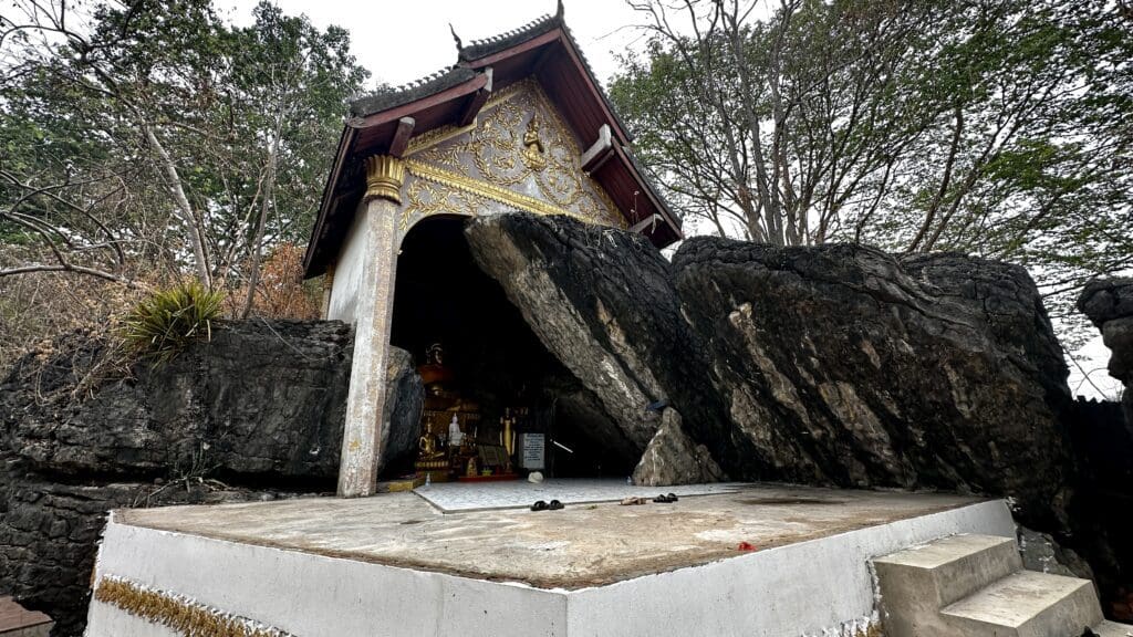 Temple inside  a rocky area in Luang Prabang Laos