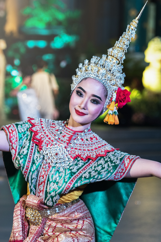 A traditional Thai dancer with colorful costume