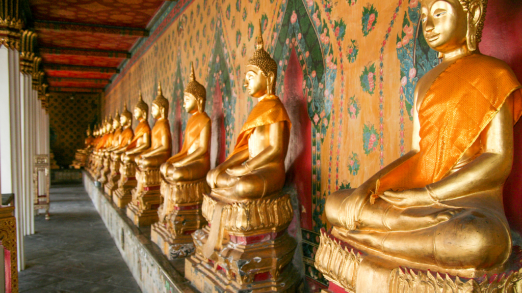 golden Buddha statues lined up