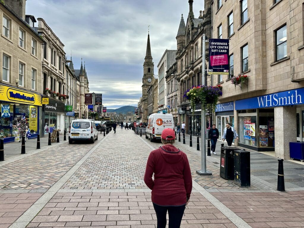 Bev from Retirement Travelers walking through the town on Inverness in Scotland