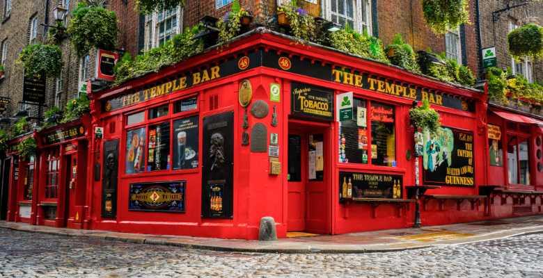 A beautiful red neighborhood bar in Dublin called Temple Bar.