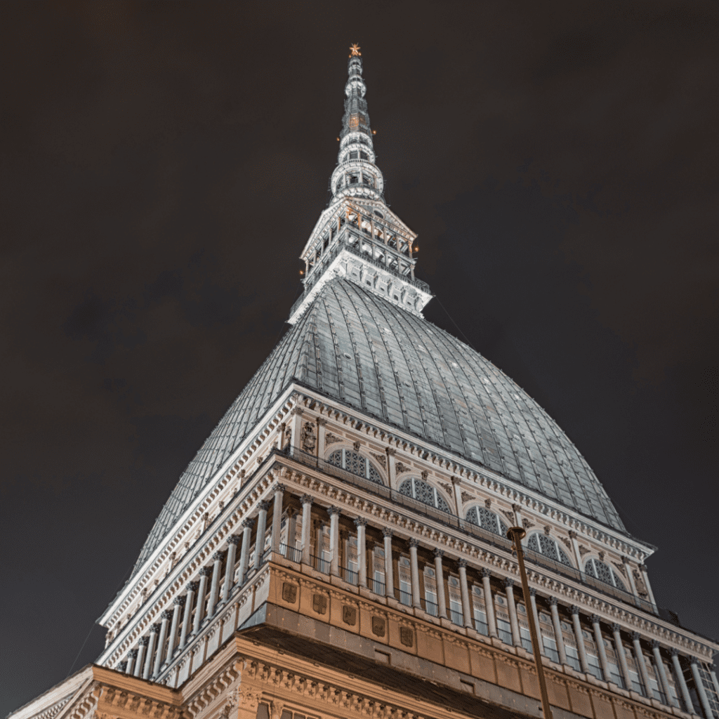 A towering spire in the city of Turin, Italy.