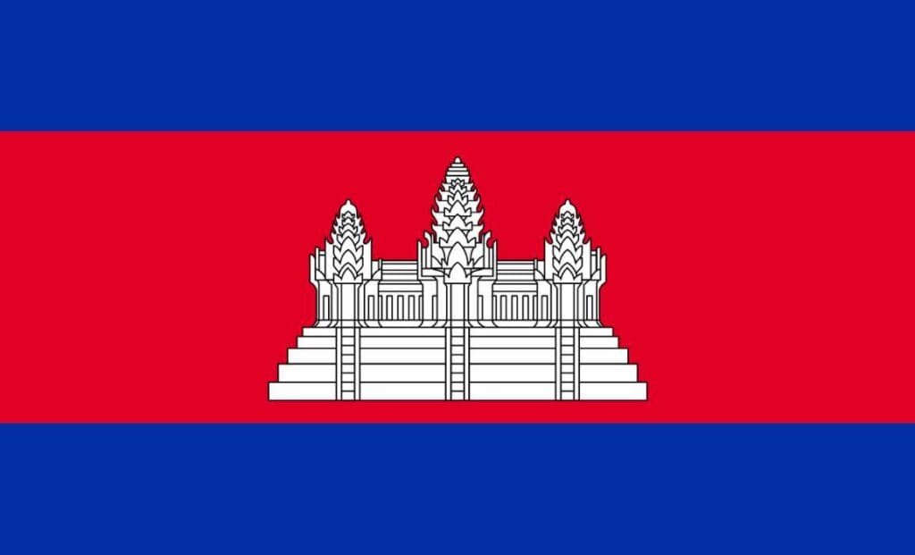 a red and blue flag with angkor wat in white in the middle.