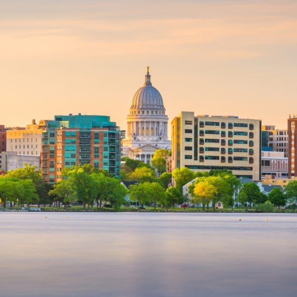 buildings and skyline of Madison Wisconsin with river in the foreground