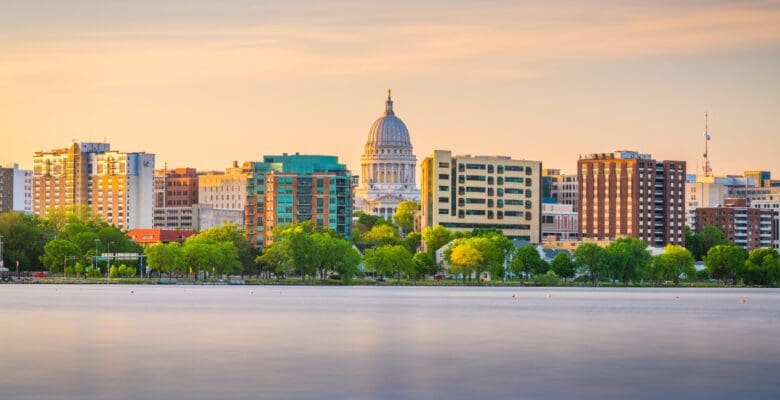 buildings and skyline of Madison Wisconsin with river in the foreground