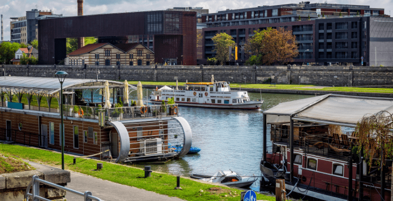 boats on the water in the Vistula River in Krakow