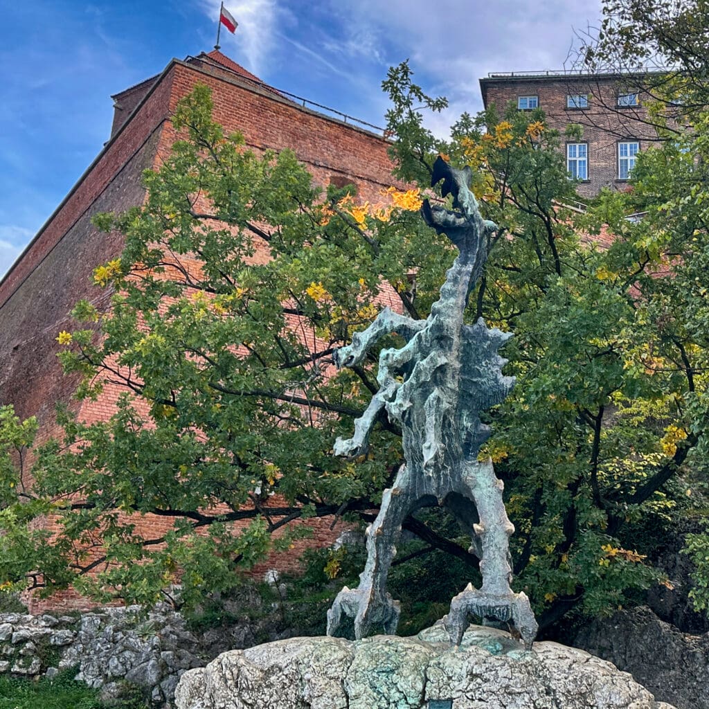 statue of a dragon by Wawel Castle in Krakow Poland