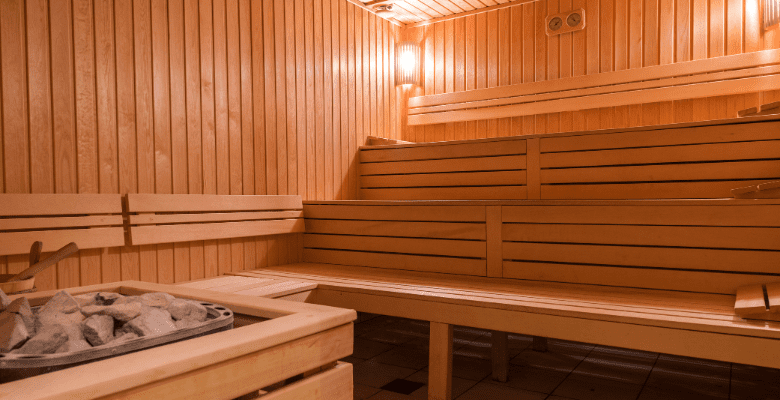 Inside wooden seating area of a Finnish sauna