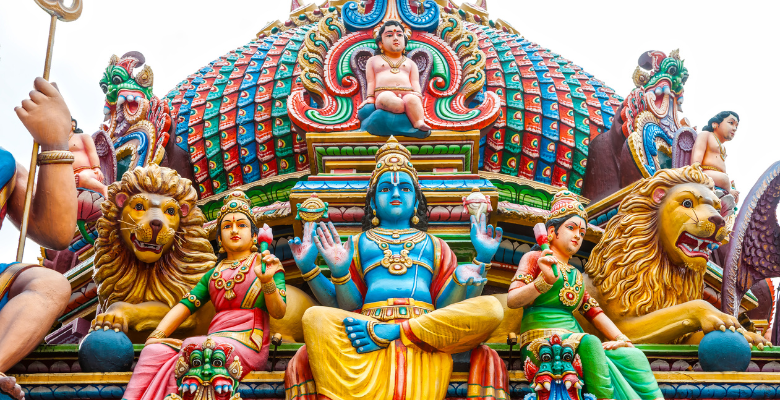 colorful buddha statues on a temple in Little India neighborhood of Singapore