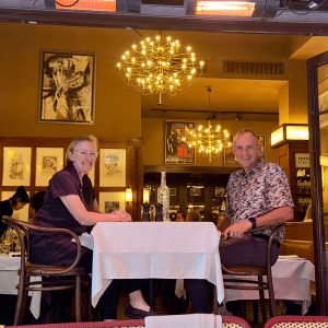 man and woman sitting at a table in a restaurant