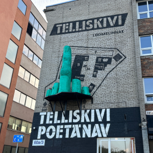 Artwork of a green hand giving a middle finger in Telliskivi City of Tallinn