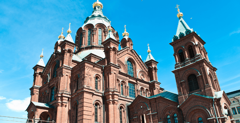 View of red bricked and green roofed Uspenski Cathedral in Helsinki