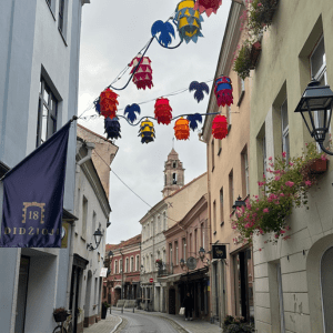 City street in Vilnius with overhead hanging decorations