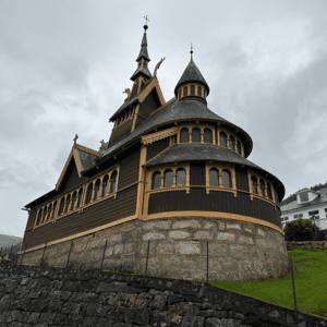 old, brown wooden church in Balestrand Norway
