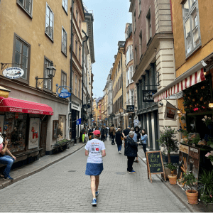 woman walking down the street in old town of Stockholm