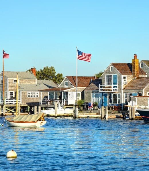 boats and houses along shore in Nantucket