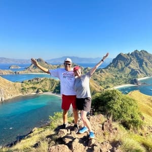 John and Bev on Padar island in Komodo National Park overlooking islands and beaches