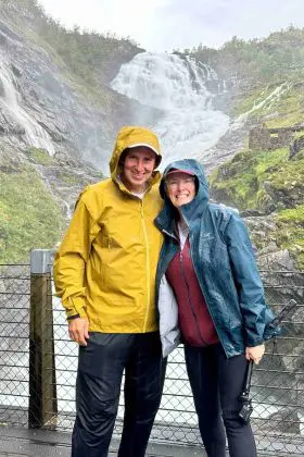 john and bev in front of falls on flam railway in norway