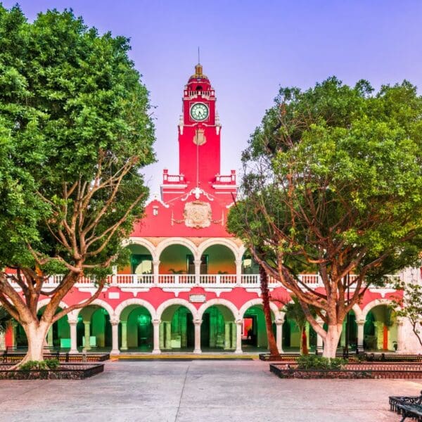 red clock tower in dowtown Merida Mexico