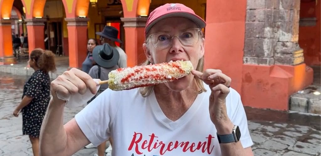 Bev biting into elote