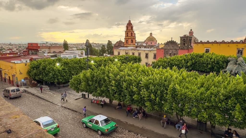 San Miguel City view with trees and chuches.