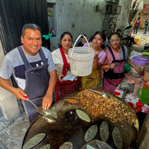 The family that runs Tlacoyos la Blanca posing for a picture.