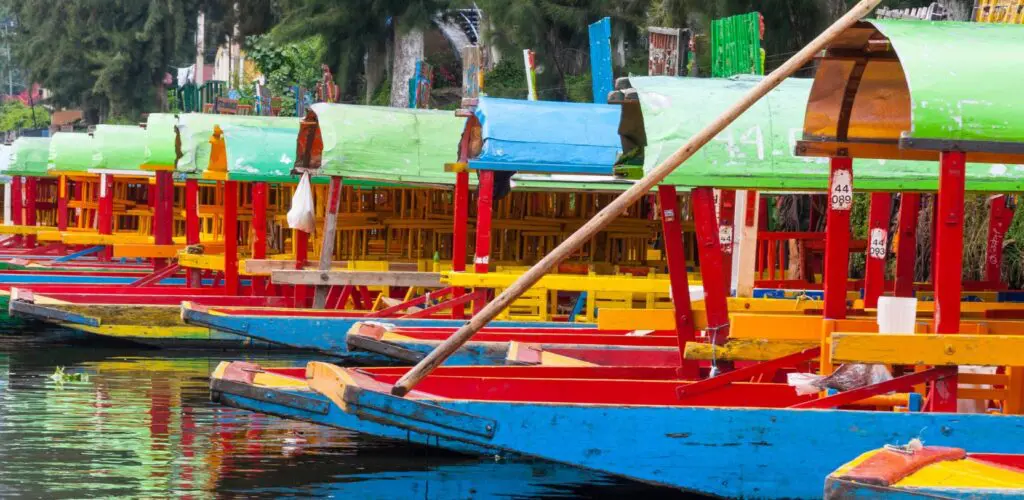 Xochimilco floating gardens with the boats on the water.