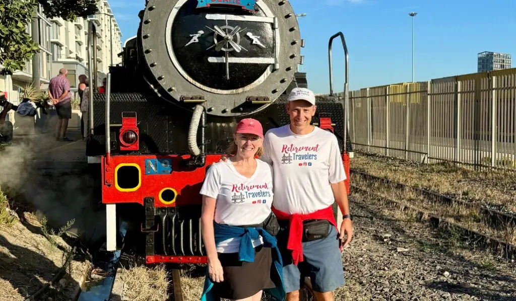 john and Bev in front of steam engine train