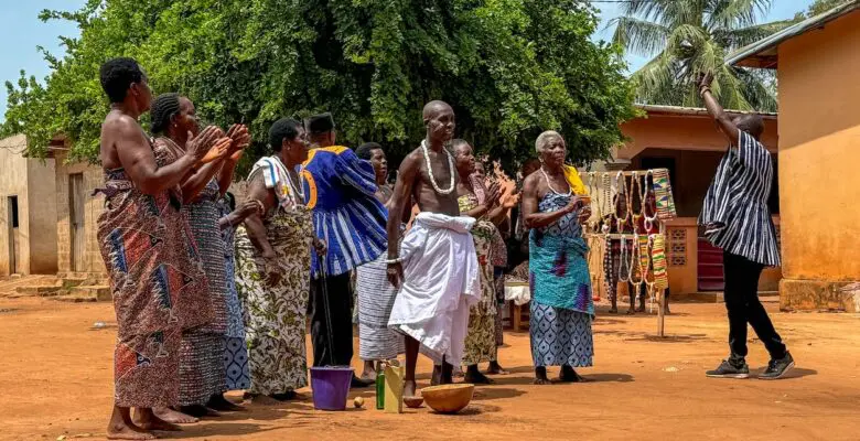 A group of men and women welcoming us to their village.