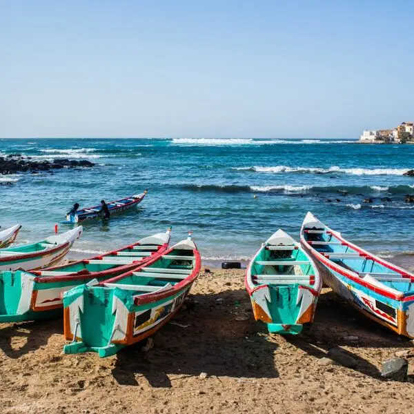 fishing boats along a shore in Senegal