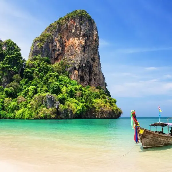 islands, turquoise water and a boat in Thailand