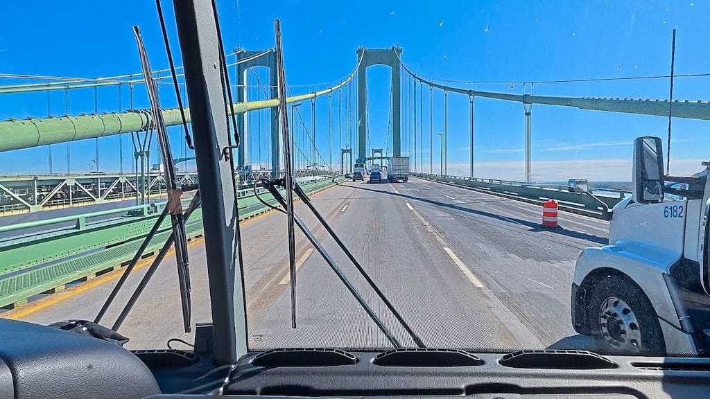 looking out the from windshield of the jet bus